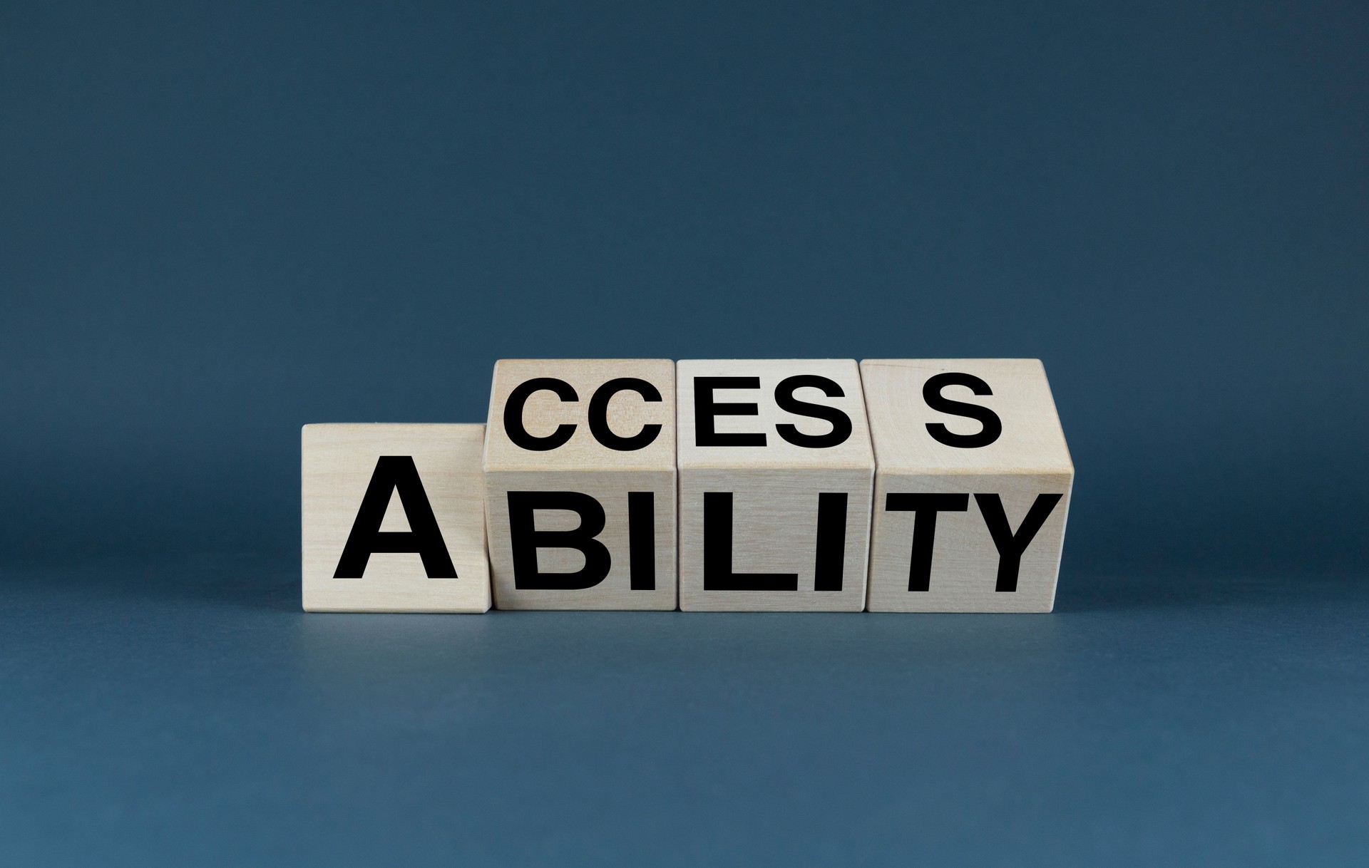 Access ability. The cubes form the words Access ability