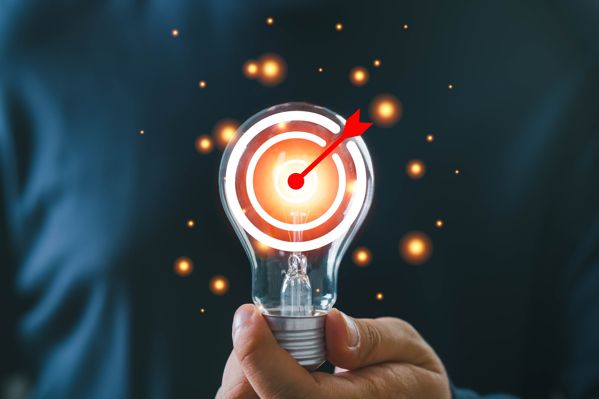 Innovative concept of targeting success with a light bulb representing ideas and creativity, capturing focus and inspiration.