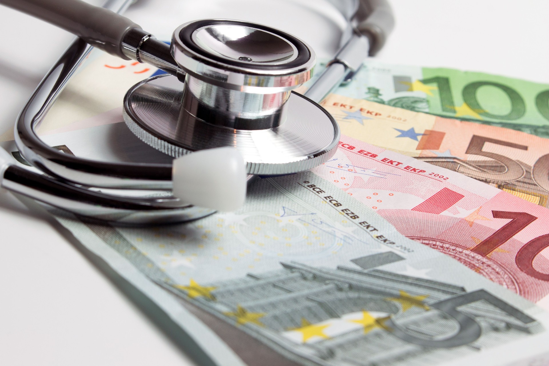 European currency with doctor stethoscope.
