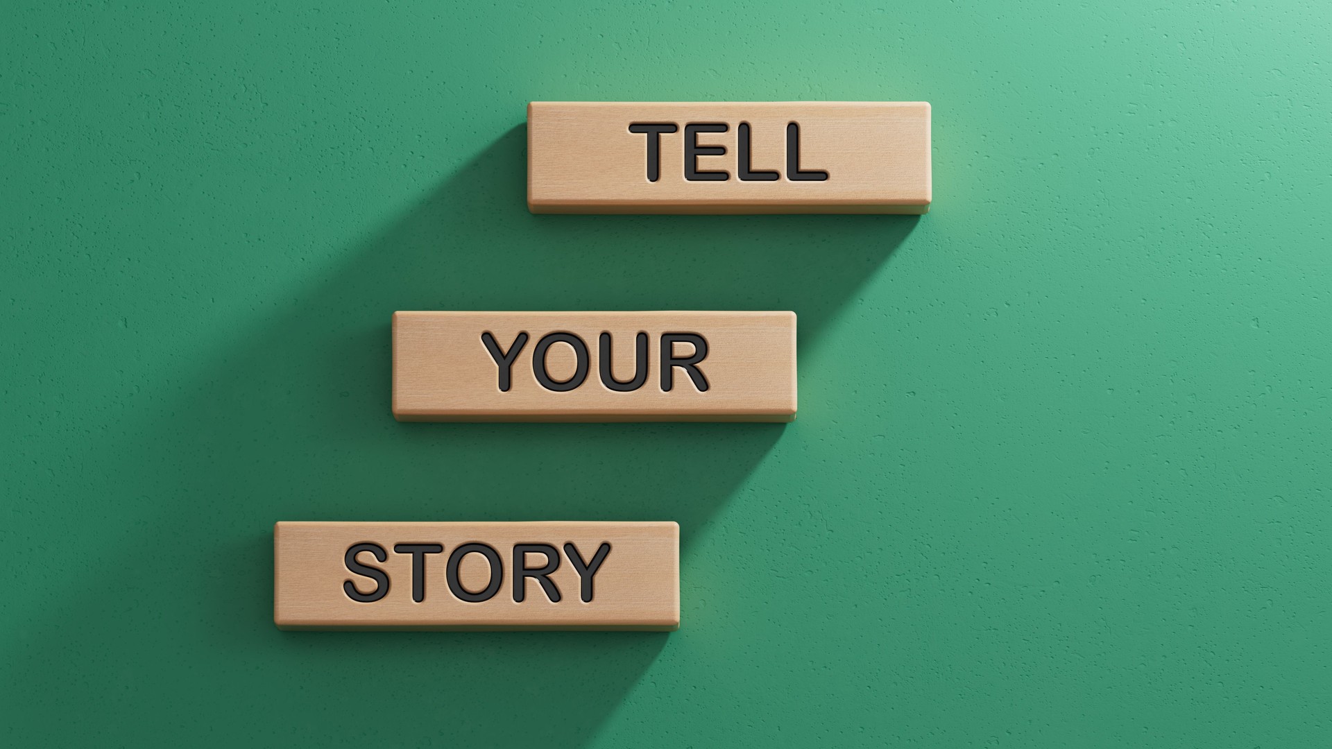Tell your story symbol. Wooden blocks with words Tell your story.  Business and Tell your story concept. Copy space.3D rendering on green background.